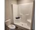 Clean and bright bathroom with a shower, toilet, and sink at 1386 Ibis Dr, Englewood, FL 34224