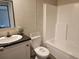 Clean and functional bathroom with a shower-tub combo, toilet, and vanity at 1386 Ibis Dr, Englewood, FL 34224