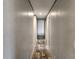 Hallway leading to various rooms in the home at 1386 Ibis Dr, Englewood, FL 34224