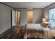 Inviting main bedroom with a cozy bed, walk-in closet, and ensuite bathroom at 1386 Ibis Dr, Englewood, FL 34224