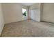 Neutral bedroom featuring a window and carpet flooring at 2302 123Rd E Pl, Parrish, FL 34219