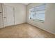 Neutral home office featuring tile floors and a window at 2302 123Rd E Pl, Parrish, FL 34219