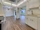 Modern kitchen with white cabinets and quartz countertops at 8188 San Jacinto Ave, North Port, FL 34287