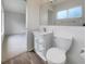 Bathroom with white vanity, toilet and view of bedroom at 8188 San Jacinto Ave, North Port, FL 34287