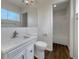 Clean bathroom with white vanity, toilet and bathtub at 8188 San Jacinto Ave, North Port, FL 34287