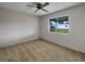 Bright bedroom with carpeted floors and a window at 8188 San Jacinto Ave, North Port, FL 34287