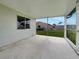 Spacious screened porch with view of backyard at 8188 San Jacinto Ave, North Port, FL 34287