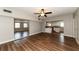 Open living room and kitchen with modern flooring at 580 Leach St, Englewood, FL 34223