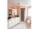 Bathroom with vanity, shower, and toilet at 156 Francis Ne Dr, Port Charlotte, FL 33952