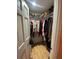 Spacious walk-in closet with ample shelving and hanging space at 156 Francis Ne Dr, Port Charlotte, FL 33952