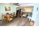 Living room with laminate flooring and open layout at 156 Francis Ne Dr, Port Charlotte, FL 33952