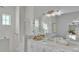Bright bathroom featuring double vanity and glass shower at 1529 Rio Vista Ter, Parrish, FL 34219
