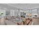 Spacious living room featuring hardwood floors, comfortable seating, and an open layout, perfect for entertaining guests at 1529 Rio Vista Ter, Parrish, FL 34219