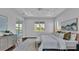 Spacious main bedroom with tray ceiling and access to the outdoors at 1529 Rio Vista Ter, Parrish, FL 34219