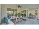 Elegant covered patio with comfortable seating, perfect for relaxing and entertaining with serene outdoor views at 1529 Rio Vista Ter, Parrish, FL 34219