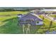 Luxury home with a screened lanai overlooking the water at 1529 Rio Vista Ter, Parrish, FL 34219