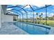 Screened-in pool with a spa and a beautiful view at 1529 Rio Vista Ter, Parrish, FL 34219