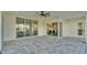 Spacious outdoor patio with paver surface and sliding glass doors leading to the interior at 1529 Rio Vista Ter, Parrish, FL 34219