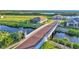 Brick bridge over canal in luxury waterfront community at 1529 Rio Vista Ter, Parrish, FL 34219