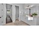 Bright bathroom with double vanity, and views into other rooms at 1529 Rio Vista Ter, Parrish, FL 34219