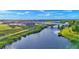 Waterfront community with lush landscaping and canal at 1529 Rio Vista Ter, Parrish, FL 34219