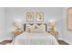 Serene bedroom with neutral tones, and wood nightstands at 1529 Rio Vista Ter, Parrish, FL 34219