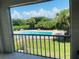 Scenic pool view from a condo balcony at 1860 Massachusetts Ne Ave # 214, St Petersburg, FL 33703
