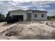 New construction home with attached garage and landscaping at 63 Coxswaine Cir, Placida, FL 33946