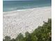 Relaxing beach view with white sand and ocean at 63 Coxswaine Cir, Placida, FL 33946