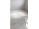 Bright white marble-look tile flooring at 63 Coxswaine Cir, Placida, FL 33946