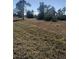 Empty lot with sparse vegetation at 63 Coxswaine Cir, Placida, FL 33946