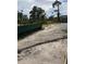 Empty lot with cleared land, ready for new construction at 63 Coxswaine Cir, Placida, FL 33946