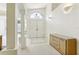 Bright entryway with double doors and tiled flooring at 533 Bent Oak Ct, Spring Hill, FL 34609