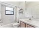Clean bathroom with tub, shower, and vanity at 533 Bent Oak Ct, Spring Hill, FL 34609