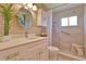 Updated bathroom with walk-in shower, grab bar, and modern vanity at 2340 Grecian Way # 46, Clearwater, FL 33763