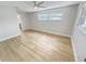 Bright bedroom with two windows and access to bathroom at 1900 63Rd S Ave, St Petersburg, FL 33712