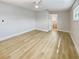 Spacious bedroom with light flooring and ceiling fan at 1900 63Rd S Ave, St Petersburg, FL 33712