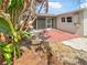 Back patio with brick pavers and screened enclosure at 1900 63Rd S Ave, St Petersburg, FL 33712