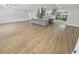 Open concept living area with modern kitchen and island at 1900 63Rd S Ave, St Petersburg, FL 33712