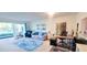 Living room with comfy seating and home office area at 531 Spring Lakes Blvd # 531, Bradenton, FL 34210