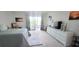 Main bedroom with a queen bed and built-in dresser at 531 Spring Lakes Blvd # 531, Bradenton, FL 34210