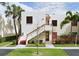 Building exterior showcasing stairs and landscaping at 531 Spring Lakes Blvd # 531, Bradenton, FL 34210