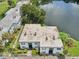 Aerial view of condo building complex near lake at 811 N Keene Rd # V7, Clearwater, FL 33755