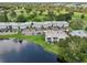 Aerial view of condo complex near golf course and lake at 811 N Keene Rd # V7, Clearwater, FL 33755