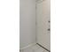 Simple condo entryway with a white door at 811 N Keene Rd # V7, Clearwater, FL 33755