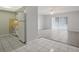 Open living area with tile floors and sliding glass doors at 811 N Keene Rd # V7, Clearwater, FL 33755