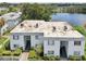 Aerial view of a building near a lake at 811 N Keene Rd # V7, Clearwater, FL 33755