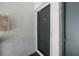 Condo building's front door with security features at 811 N Keene Rd # V7, Clearwater, FL 33755
