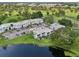 Aerial view of condo complex near golf course and lake at 811 N Keene Rd # V7, Clearwater, FL 33755