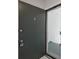 Condo's front door with keypad lock at 811 N Keene Rd # V7, Clearwater, FL 33755